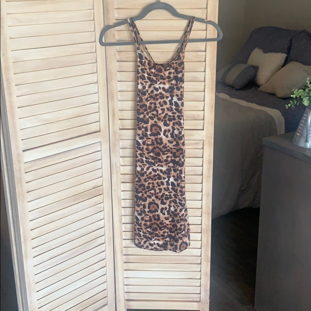 Backless tight cheetah dress.